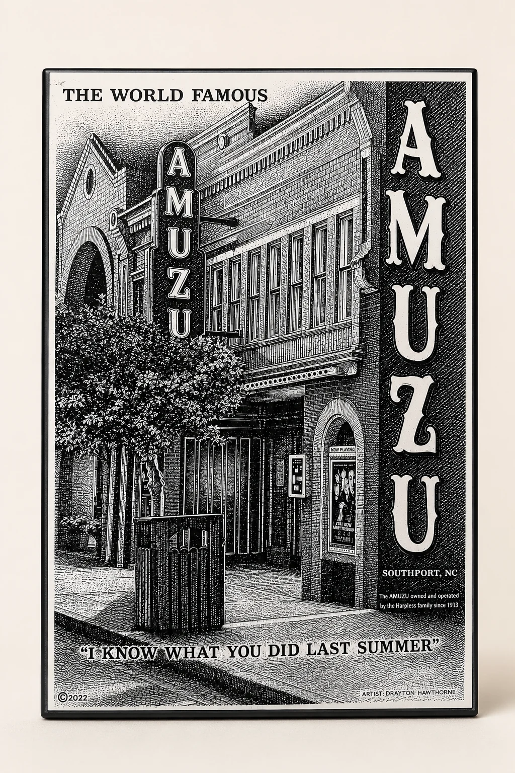 Engraved tile depicting the AMUZU Theatre in Southport, North Carolina