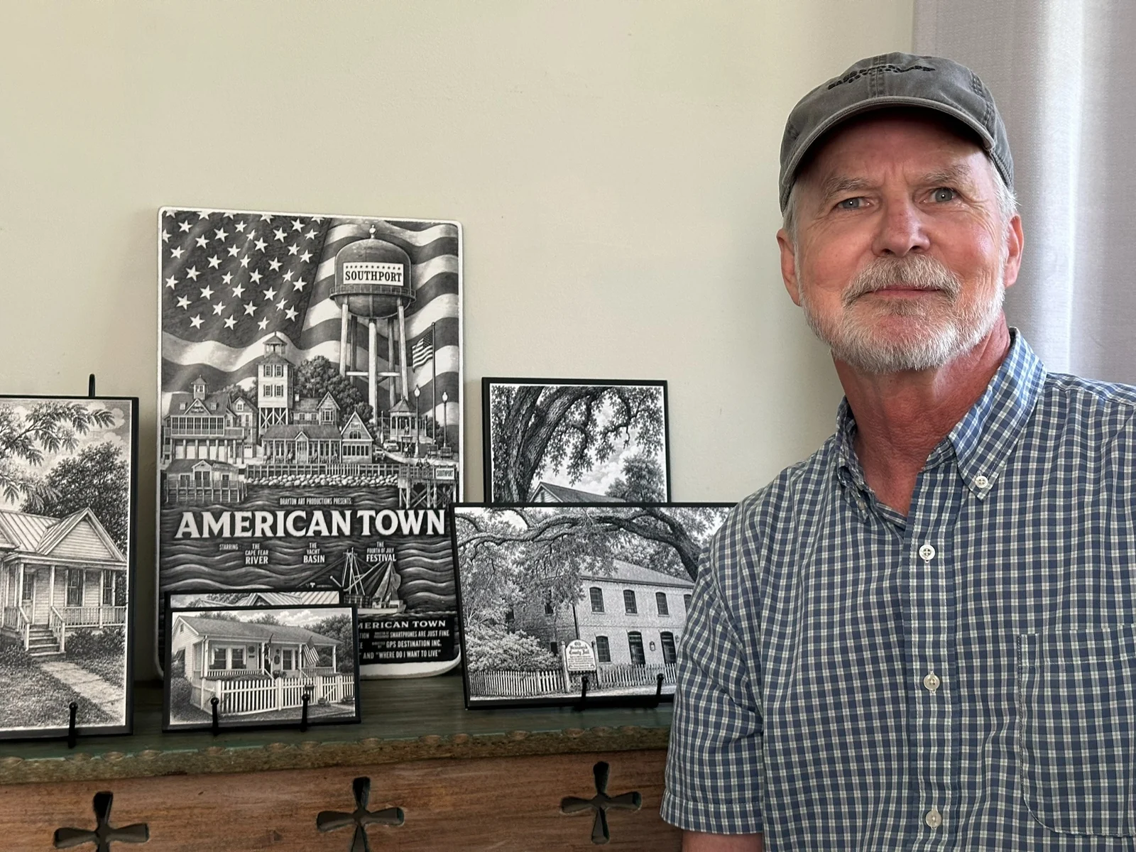 Drayton Hawthorne with examples of his engraved Southport tile artwork
